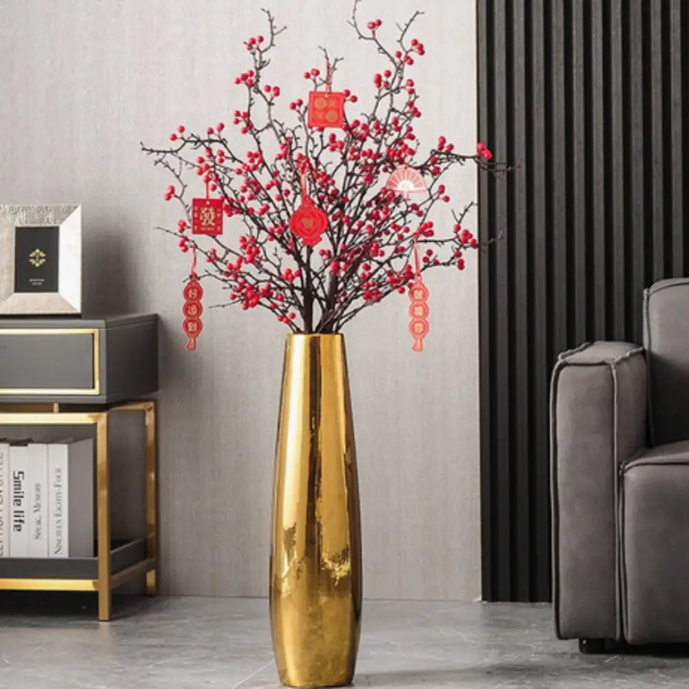 Grand vase doré à poser au sol