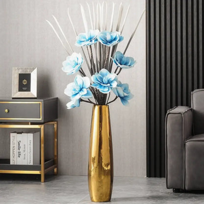 Grand vase doré à poser au sol