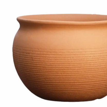 Gros pot de fleur en terre cuite