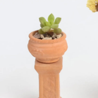 Mini pot de fleur en terre cuite