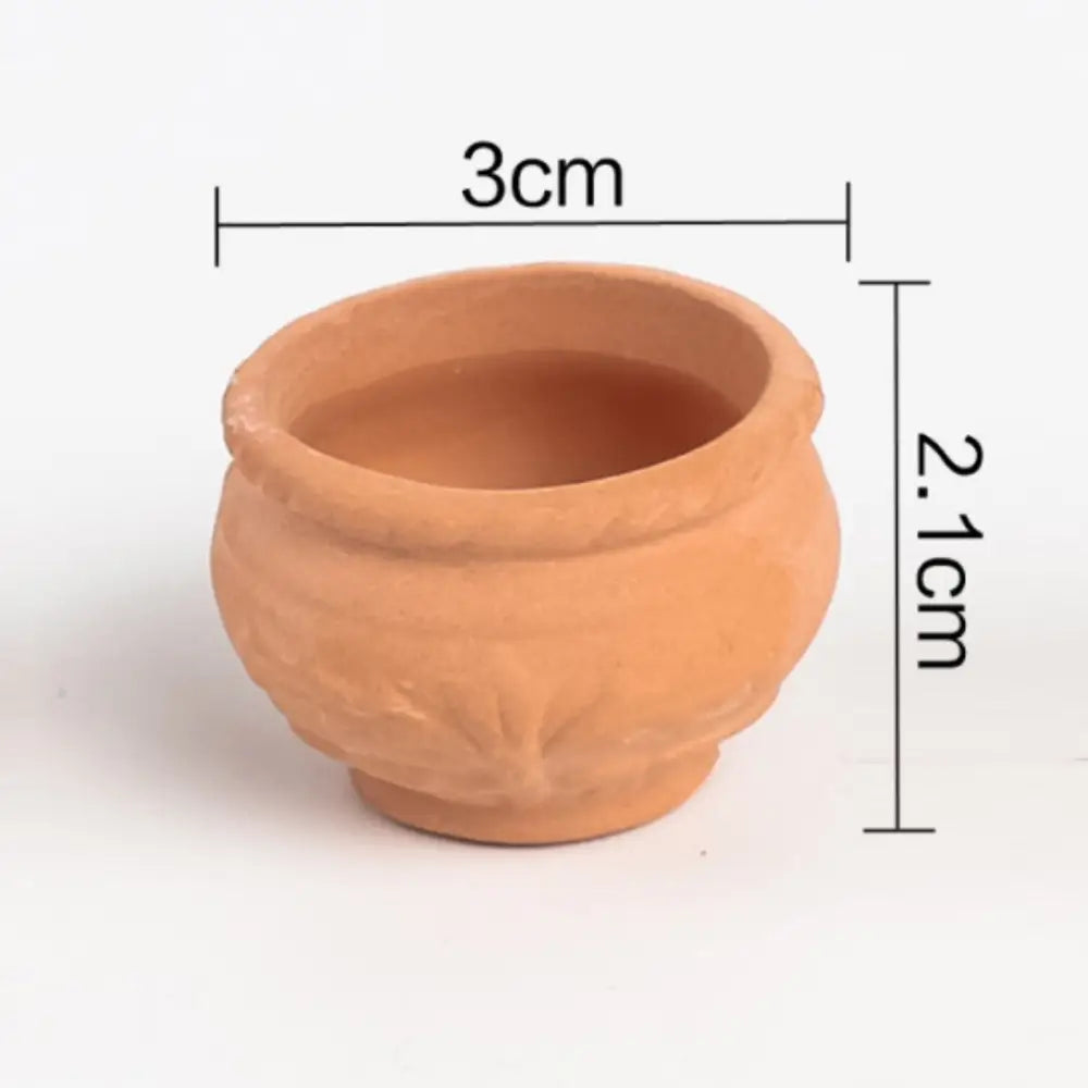 Mini pot de fleur en terre cuite