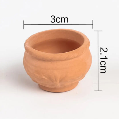 Mini pot de fleur en terre cuite