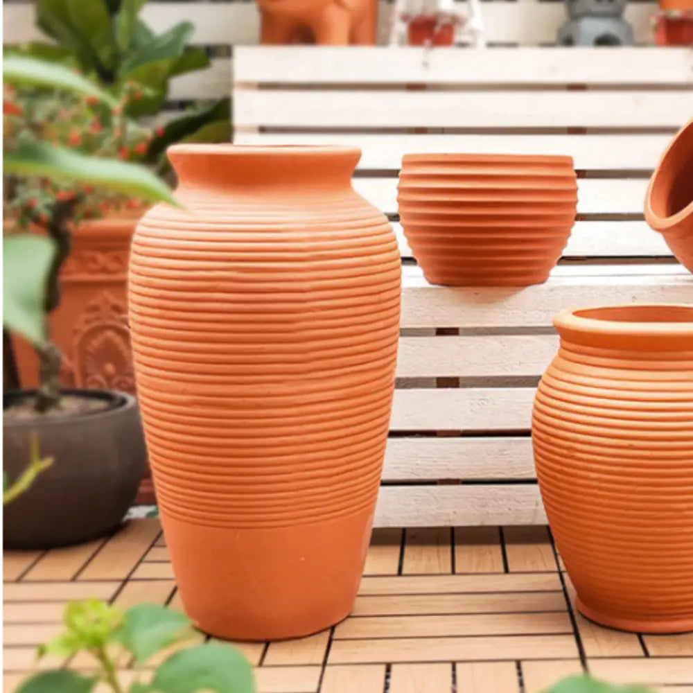 Pot de fleur haut terre cuite