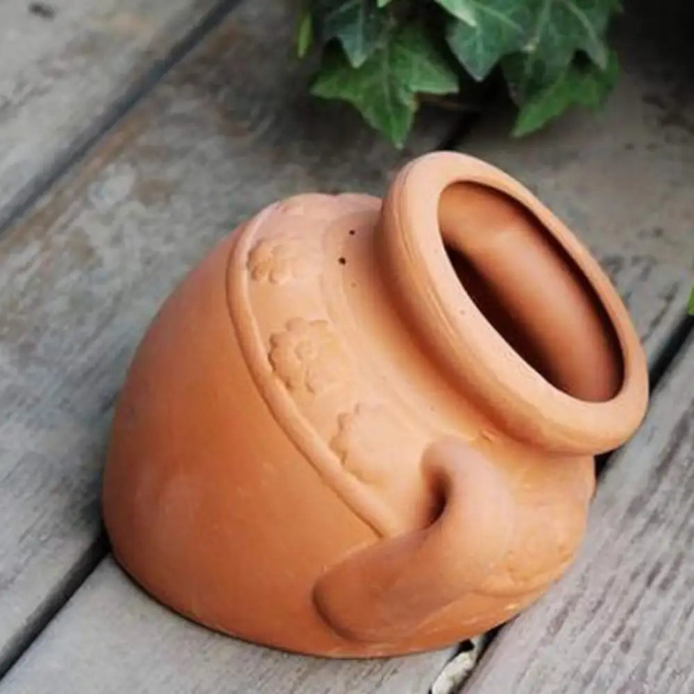 Pot de fleur mural en terre cuite