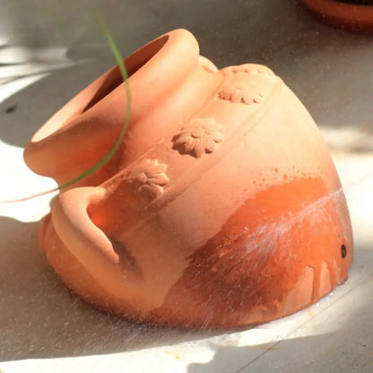 Pot de fleur mural en terre cuite