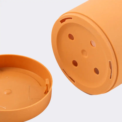 Pot de fleur plastique orange