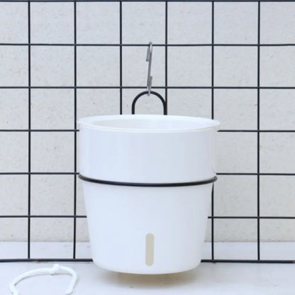 Pot de fleur suspendu avec réserve d'eau
