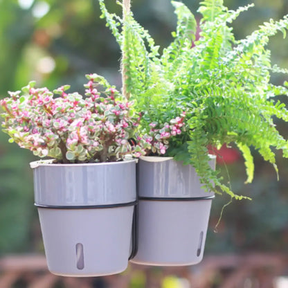 Pot de fleur suspendu avec réserve d'eau