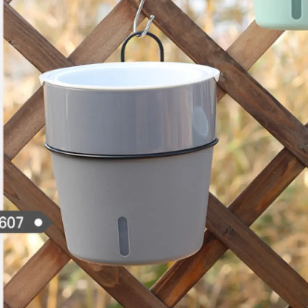 Pot de fleur suspendu avec réserve d'eau