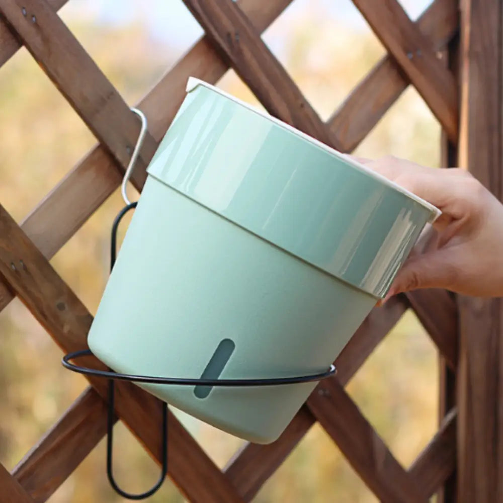 Pot de fleur suspendu avec réserve d'eau