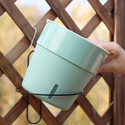Pot de fleur suspendu avec réserve d'eau