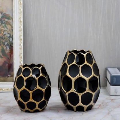 Vase noir doré