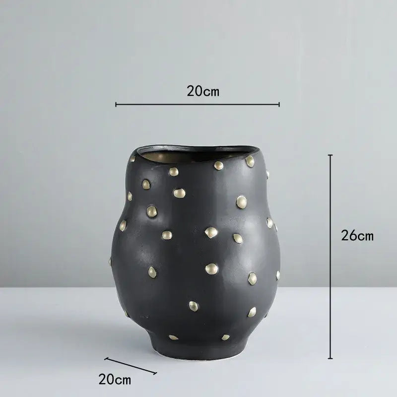 Vase noir et or